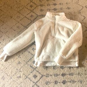 Soft, fuzzy, white, half zip, barley worn ,daughter grew out of.